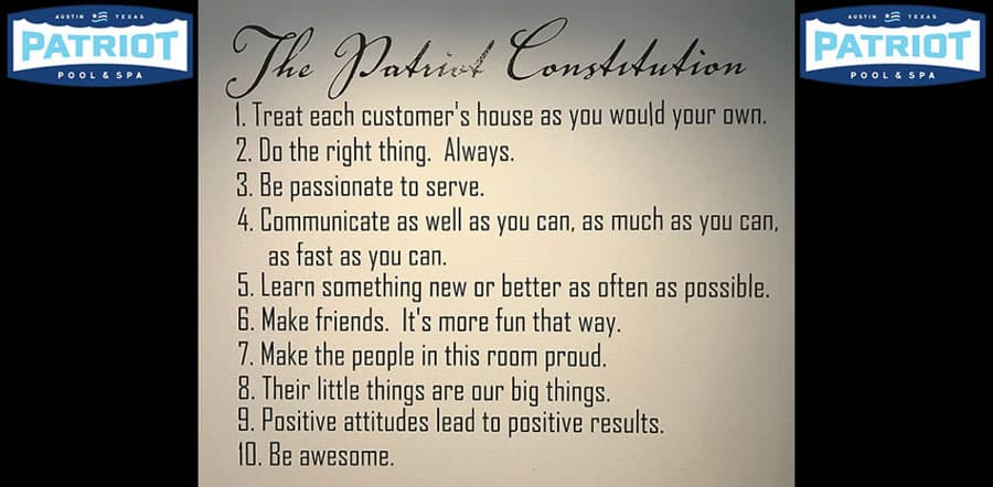 A sign titled "The Patriot Constitution" at Patriot Pool and Spa lists nine customer service principles, including treating customers' homes well, doing the right thing, communicating, learning, valuing details, and being awesome.